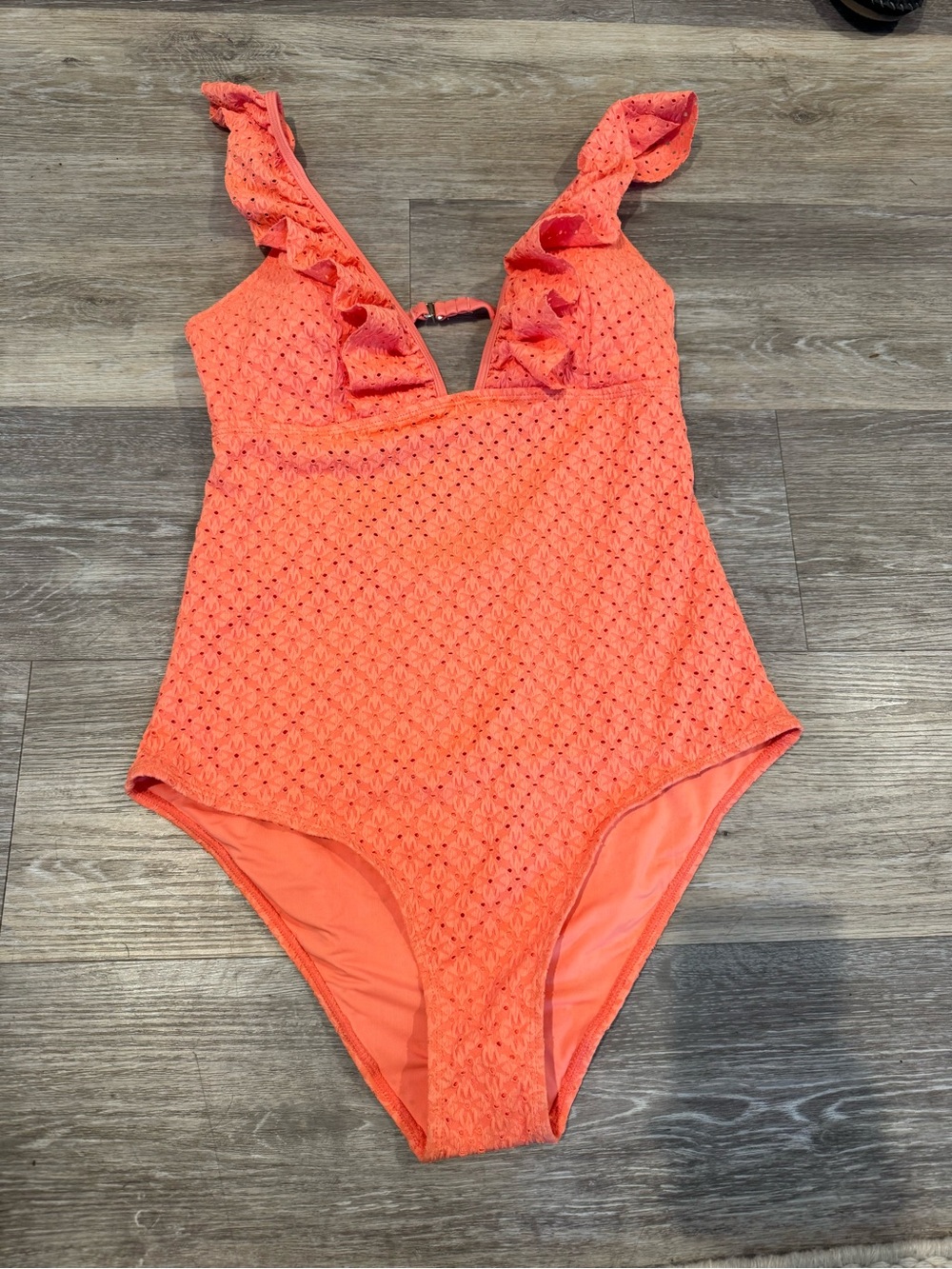 NWT Betsey Johnson one-piece swimsuit in coral orange & deep V-neck ruffled trim